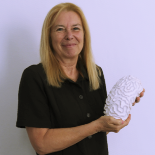 Annick holding Brain & Bean sculpture