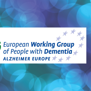 EWGPWD logo on blue and green lights background