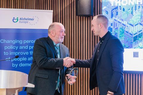 Third place awarded to Balint Szajki by Kevin Quaid, Chair of the EWGPWD