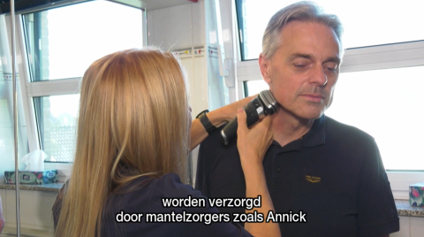 Annick helping Geert to shave